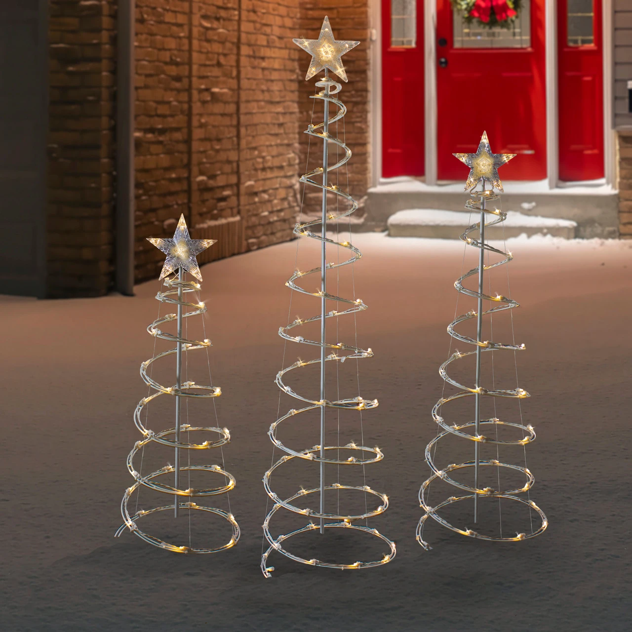 Set Of 3 LED Lighted Warm White Outdoor Spiral Christmas Cone Trees 3', 4', And 6' 2 Set Of 3 LED Lighted Warm White Outdoor Spiral Christmas Cone Trees 3', 4', And 6' - Image 2